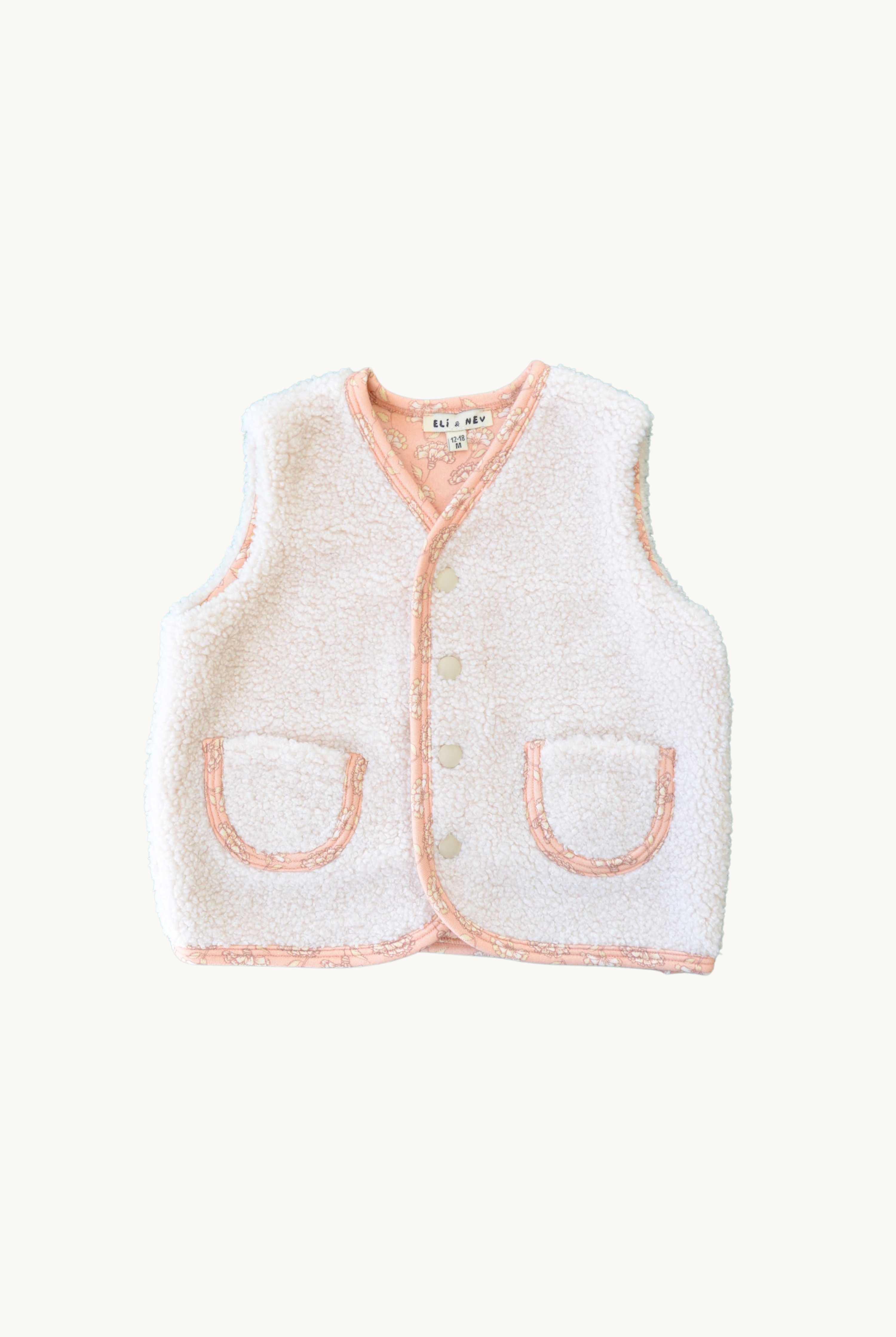 Rosalie Teddy Vest Baby Outerwear Front View – Soft Cream Sleeveless Vest with Pink Floral Lining, Cozy & OEKO-TEX Certified