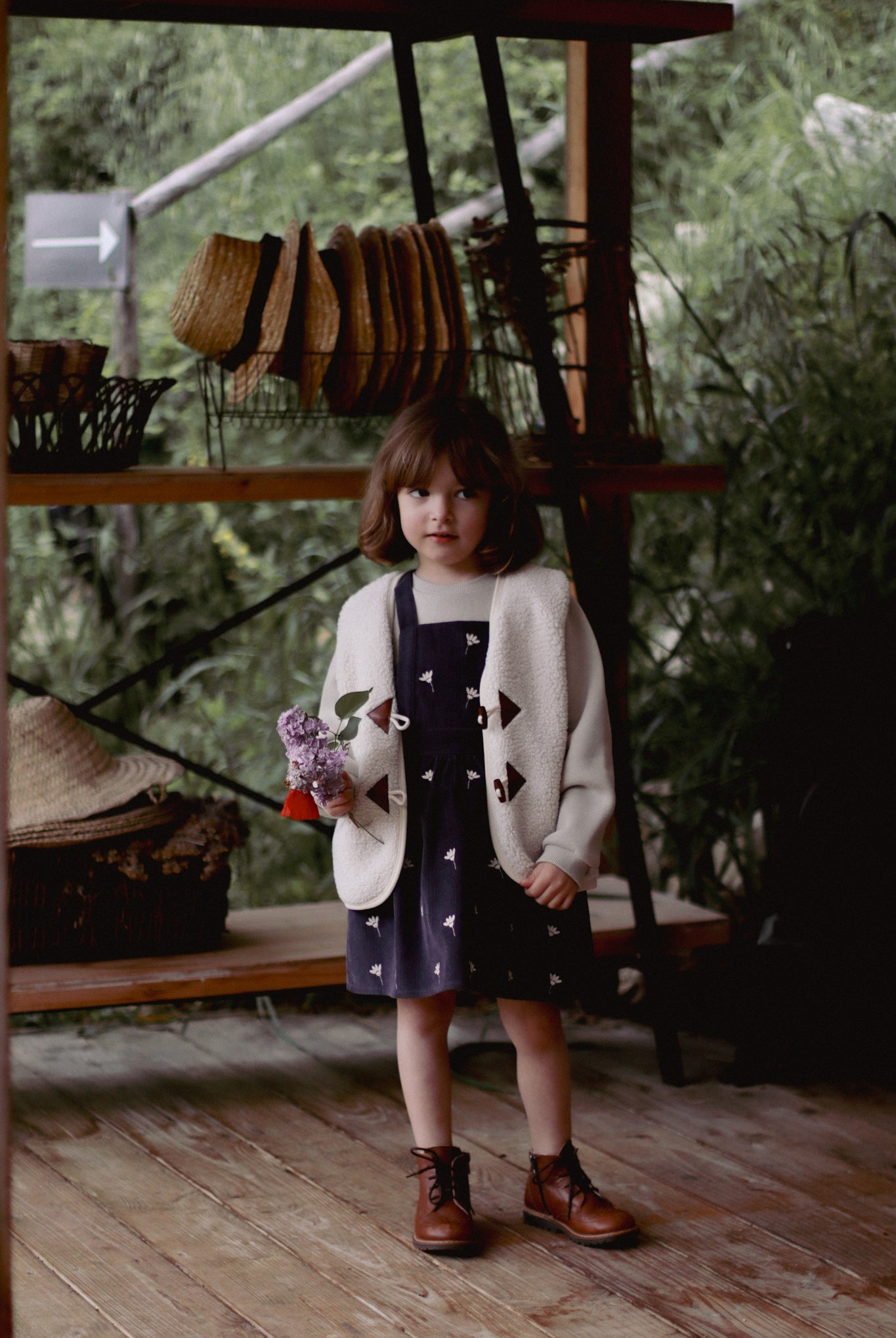 Baby Toddler vest faux sherling worn by toddler girl, cozy outwear layering