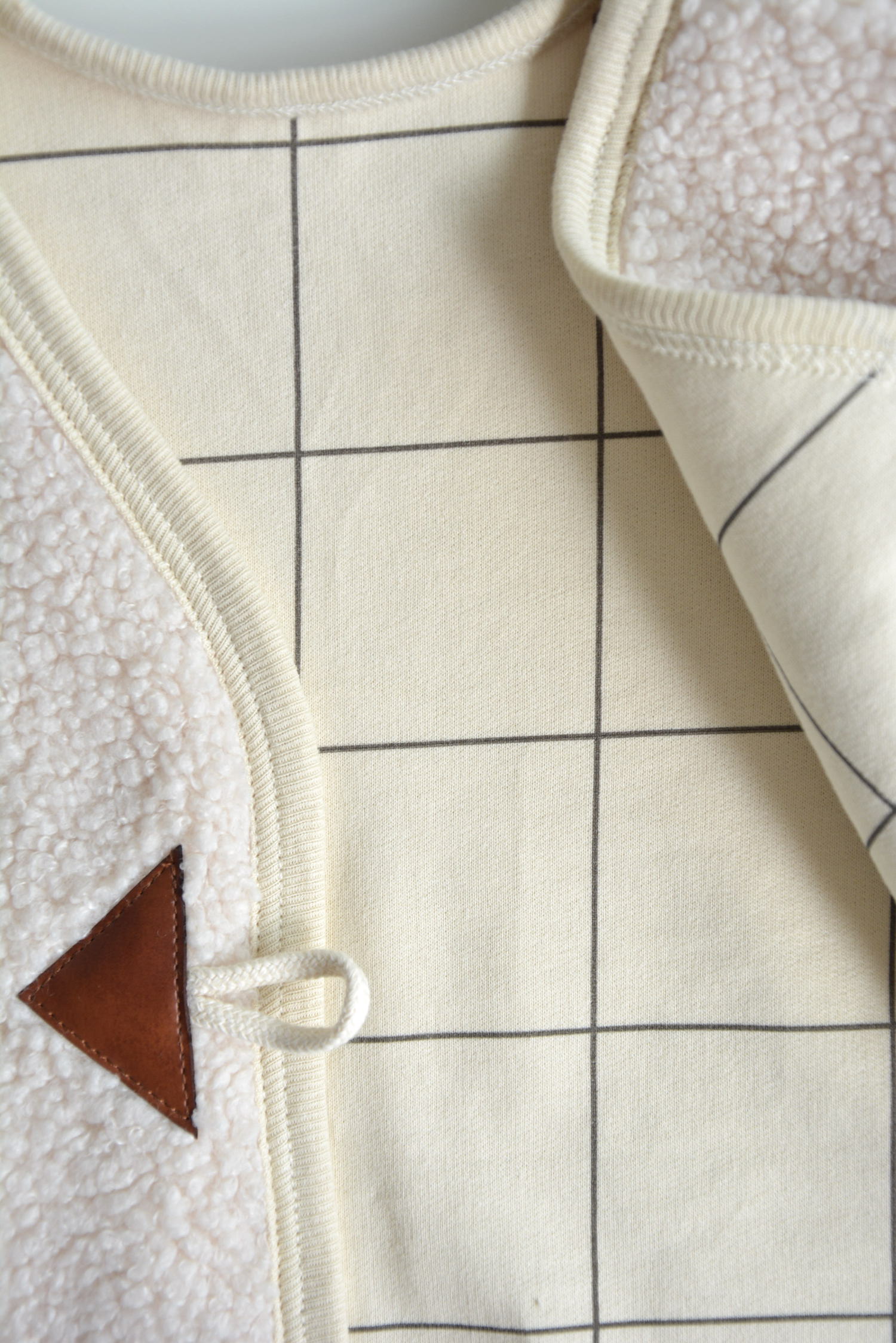 Close-Up of Nestor Baby Sherpa Vest – Beige and Grey Check Cotton Lining Inside Cream Teddy Outerwear for Toddlers